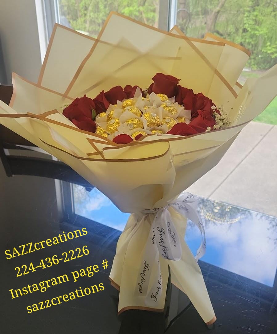 Red rose and Ferrero Rocher bouquet wrapped in gold paper with ribbon