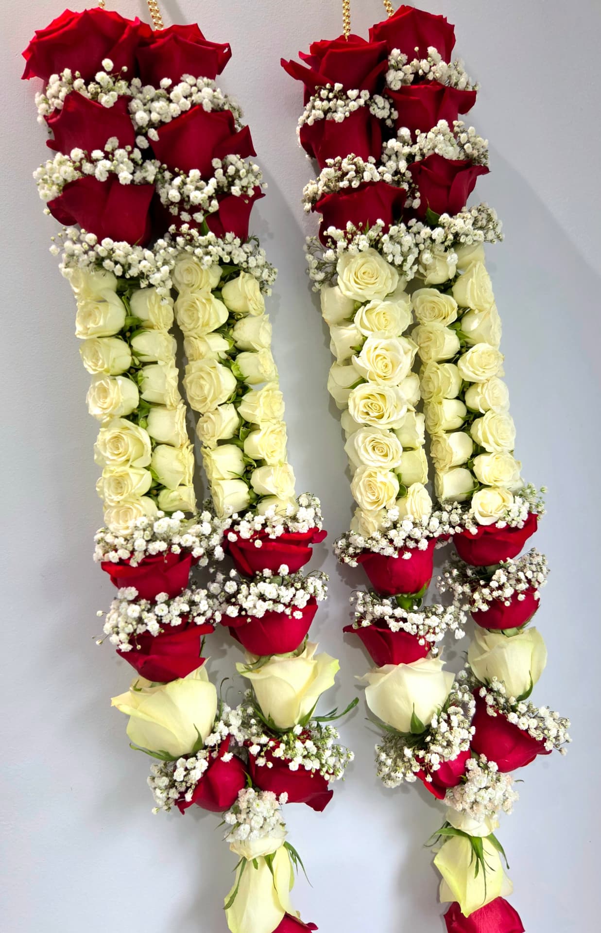 Red and ivory spray rose wedding garland pair with baby's breath