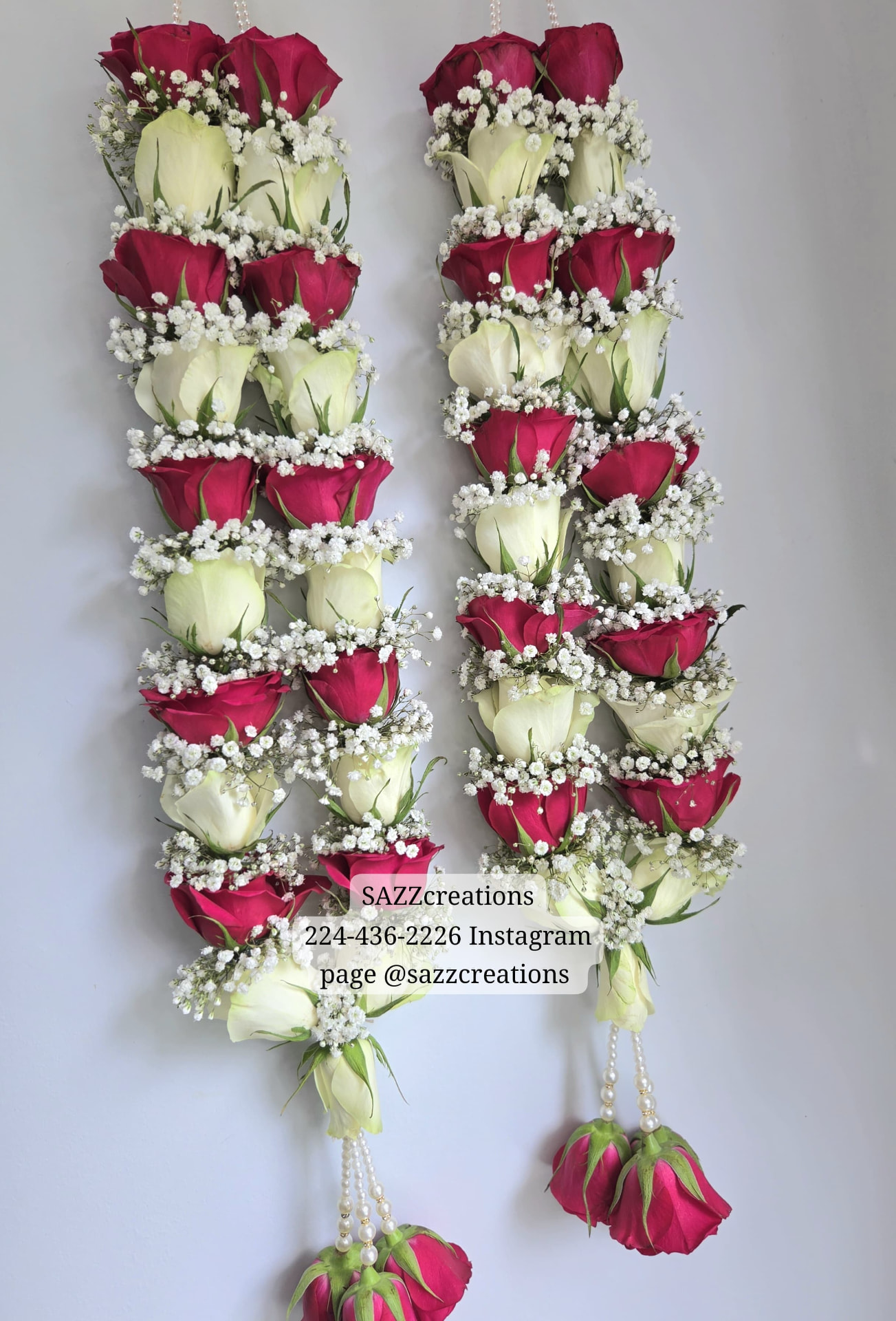 Red and ivory rose wedding garland pair with baby's breath