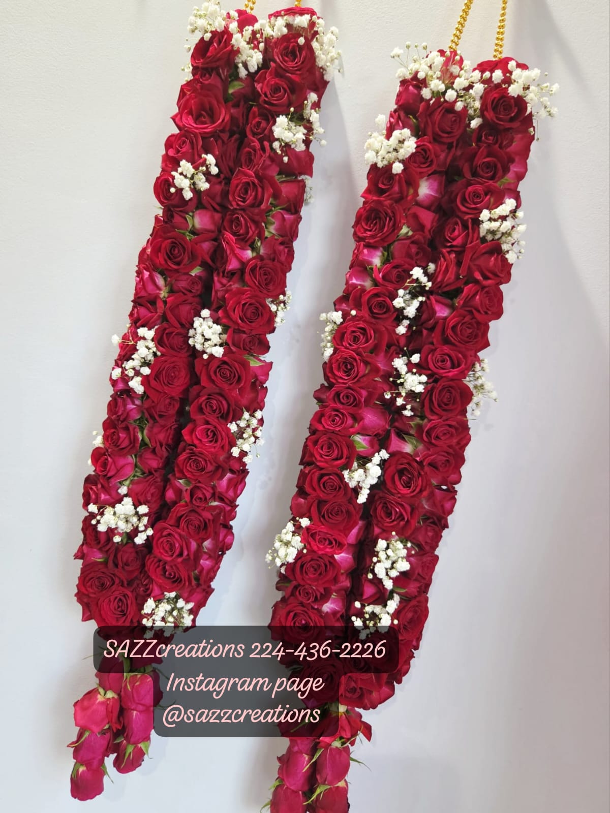 Luxurious deep red rose wedding garland pair with baby's breath