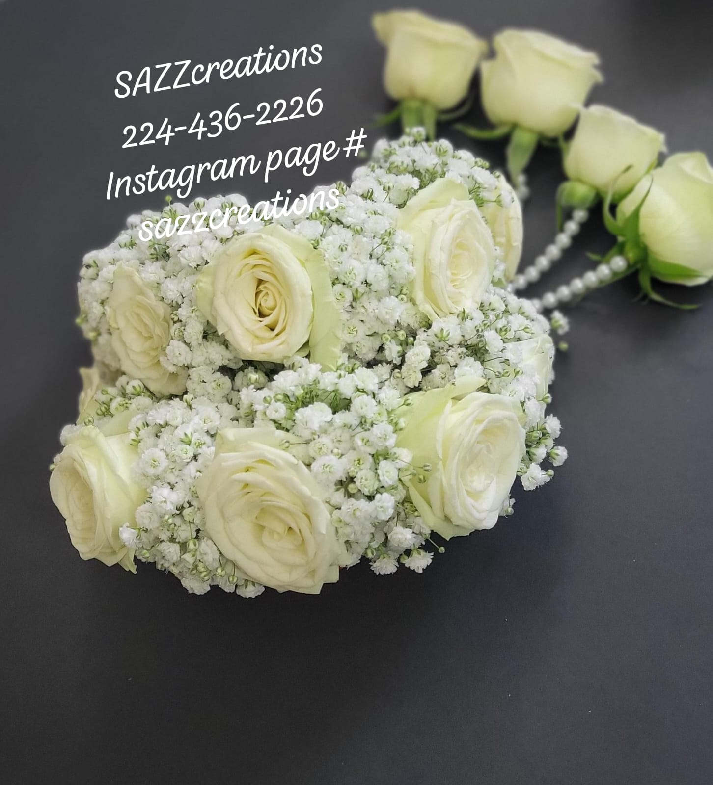 White rose and baby's breath hand gajrey with pearl strands