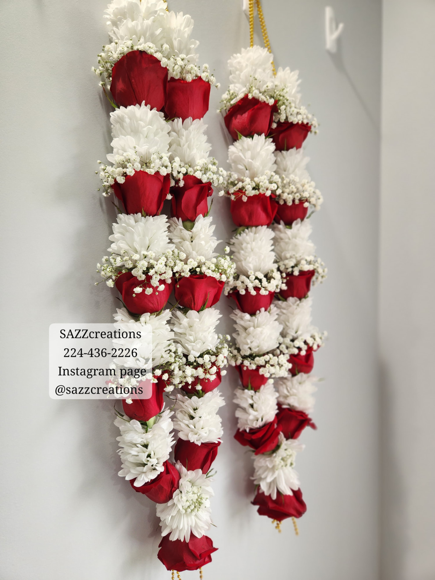 Hanging red rose and white chrysanthemum garland pair with baby's breath and gold chains