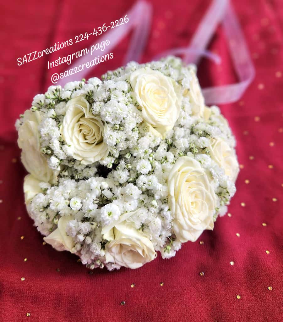 White rose bridal gajra bouquet with baby's breath